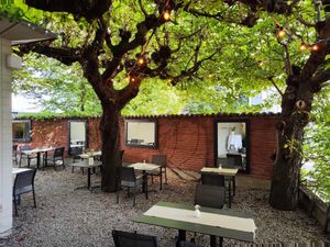 Garden seating in the back, somewhat noisy still at Maihöfli in Luzern