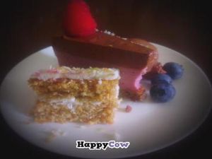 Desserts off the second menu: raw raspberrie and chocolate pie & coconut cake at Veggies on Fire in The Hague