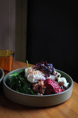Avo Loaded Hash Brown ~ avocado, tomato salsa, beetroot hummus, feta, seeds (v) at Bowery Kitchen and Bar in Katoomba