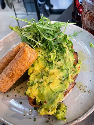 Vegan spicy avocado with vegan sausages at The Old Fire Station in Salford