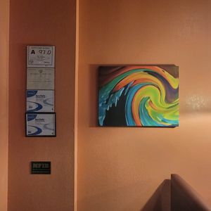 Artwork and sanitation rating at Cafe Capistrano in Raleigh