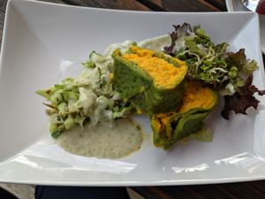 Green Crepes with carrot filling at Die Weinstube Nachhaltig Geniessen in Zeltingen