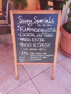 Advertisment board at Die Weinstube Nachhaltig Geniessen in Zeltingen