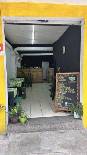 Menu board and eating area  at Cielo Verde  in Puerto Vallarta