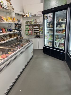 Backroom of the store with refrigerated goods  at Vegan Wolf  in Vienna