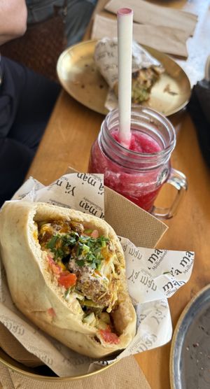 Cauliflower pita and sour cherry slushy with  vegan malafel in the background.  at Yaman Mullumbimby in Mullumbimby