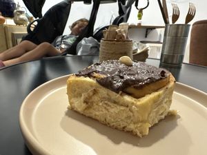 Vegan cinnamon roll with chocolate. Nice indoor patio too.  at Natury in Barcelona