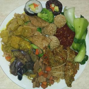 Where do I begin? Curry, tofu, sushi, eggplant, bok choy... everything on this plate (and the 2 after this one) were amazing! I really can't say enough good things about this establishment! at Pepper Tree Veggie Cuisine in Houston