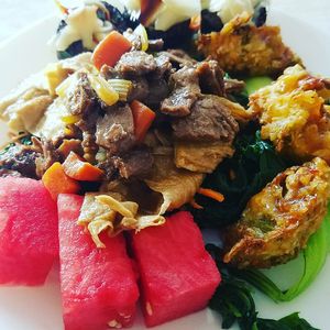 Watermelon, fritters and vegan beef at Pepper Tree Veggie Cuisine in Houston