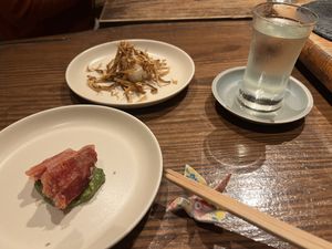 Left: tempura beets. Center: lotus and burdock sushi. Right: Sake  at veggie tempo & sushi in Tokyo