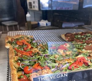 I tasty vegan pizza with violife vegan mozzarella  at Williamsburg Pizza - Lower East Side in New York City