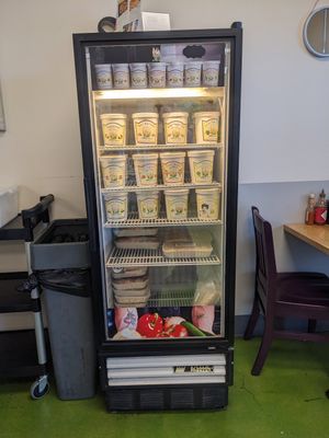 Case with soup and prepared foods (lasagna and tamales) at Great Full Gardens Cafe & Eatery in Reno