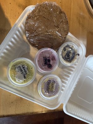 Variety of vegan raw cheesecakes, and ginger molasses cookie  at Great Full Gardens Cafe & Eatery in Reno
