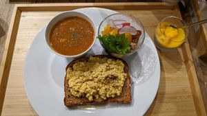 "egg" set - scrambled tofu on toast, lentil soup, quinoa salad and mango chia pudding at The Kind  in Kyoto