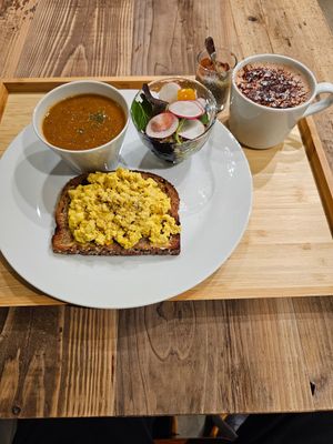 Plant based eggs, a lentil soup, fresh salad, apple and cinnamon chia pudding and a hot chocolate at The Kind  in Kyoto