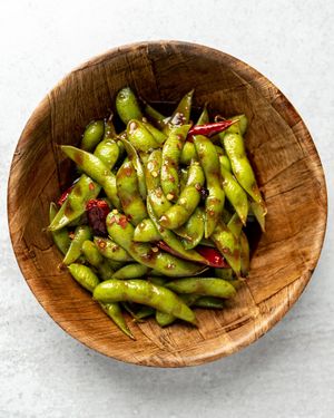 Spicy Garlic Soy Edamame 🌶

Soybeans in a pod, stir-fried in a sweet & spicy garlic sauce. at Tso Chinese Takeout & Delivery - Round Rock in Round Rock