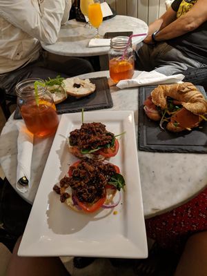 Bagel with vegan cream cheese, the vegan teriyaki bagel and I had the vegan croissant with hummus, vegan ham and salad! All was amazing!!  at Bagel in Mallorca