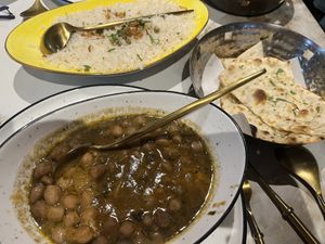 Pindi chole with garlic naan bread  at Atithi Indian Restaurant Eindhoven in Eindhoven