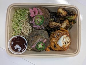 Fritters with two types of rice, brussels sprouts and sweet potatoes
 at Greene's Farmhouse Foods in Milledgeville