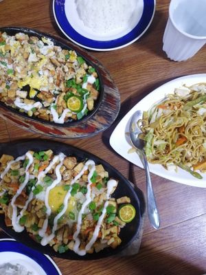 Tofu Sisig (with egg) and Tofu Pancit at Mila's Restaurant in Moalboal