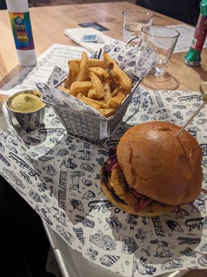 Vegan chicken burger with fries and vegan curry mayo at Left Field Brewery in Toronto