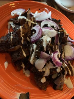 Chilaquiles con mole  at The Grain Cafe in Los Angeles