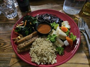 BYO Bowl Basic 5: Sea Veggies, Veggie of the day, quinoa, black beans, tempeh, and salad roja. Topped woth some more hot sauce(delicious)! at The Grain Cafe in Los Angeles