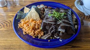 Enchiladas con salsa de mole at The Grain Cafe in Los Angeles
