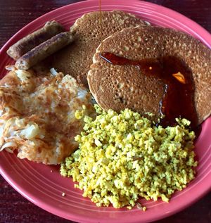 The Grain Pancakes with tofu egg, hash browns, and house made sausage  at The Grain Cafe in Los Angeles