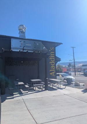 Shaded patio on the north side of the building, by Paris Lash at Aladdin's Market & Kitchen in Reno