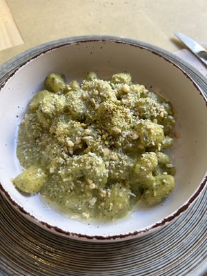 GNOCCHI IN GREEN PESTO WITH ALMONDS AND "PARMESAN”  at Umami Good Food - La Laguna in Tenerife