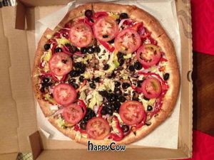 Veggie gourmet pizza topped with daiya cheese at RedBrick Pizza in Bakersfield