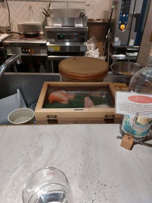 Place at the counter right in front of the sashimi and the kitchen at MOON and BACK in Kyoto