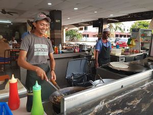 friendly staff - preparing dosa at Tomato Nasi Kandar in Langkawi