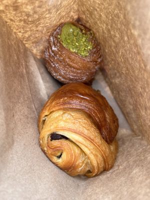 (From the pastry location) pistachio cruffin and pain au Chocolat   at Saint-Jean Deli in Amsterdam