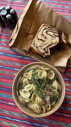 Vegan pasta pesto with mushroom and a kind of cinnamon cake, was really nice!  at Saint-Jean Deli in Amsterdam