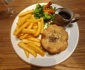 Mushroom & Ale Pie served with herb-roasted carrots, seasonal veg, gravy and oven-baked chips at De Trafford Arms Hotel in Alderley Edge