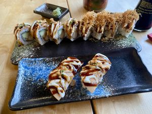 Meatlovers box part 2. Baecon roll, Flamed beef roll and Flamed beef nigiri: all very good at NORI | Vegan Sushi - Wok in Rotterdam