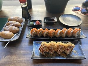 4 pcs Spicy Tuna Roll, 4 pcs Spicy Salmon Roll, 4 pcs Flamed Baecon Roll, 4 pcs Fried Bananaa  at NORI | Vegan Sushi - Wok in Rotterdam