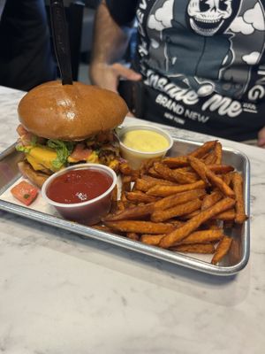 California burger with a side of sweet potato fries at Brick City Vegan in Montclair