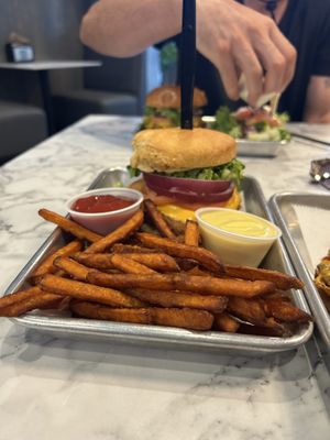 Chicken biscuit with a side of sweet potato fries at Brick City Vegan in Montclair