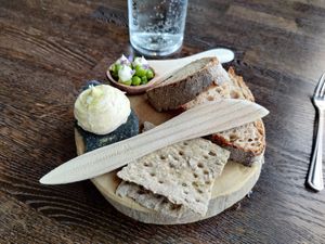 To begin with - honey-glazed bread (they asked first), margarine with spruce if I'm not wrong, peas with some sauce at Sky Kitchen & View  in Rovaniemi