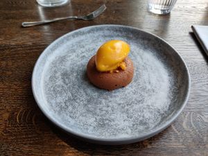 The super dessert made with cloudberry and chocolate. DELICIOUS at Sky Kitchen & View  in Rovaniemi