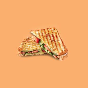 Vegan Breakfast Sandwich (multigrain bread, vegan cheese, vegan meat, vegan BBQ sauce, lettuce, tomatoes) at SQUAREAT in Miami Beach