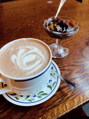 Hot chocolate and mousse 💜  at Distant Days  in Helsinki