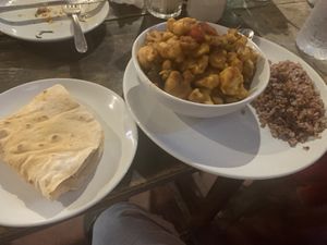 Super tasty cauliflower Manchurian with rice and a plain chapati. So so so good!  at Tasty Cafe in Tiruvannamalai
