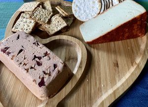 Vtopian sun dried tomato Brie and pumpkin seed Muenster   at Vtopian Cheese Shop in Portland