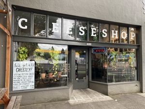 Cheesy storefront.  Not sure if the missing H was intentional or not…  at Vtopian Cheese Shop in Portland
