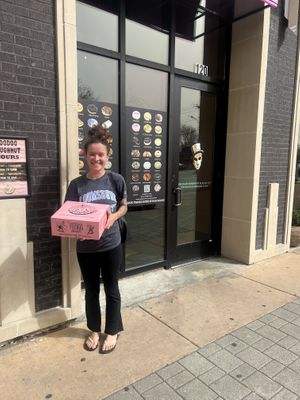 I was sooooo happy!! (Before I realized they only gave me 11😫)  at Voodoo Doughnut in Dallas