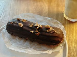 eclair with nuts  at Olivka in Almaty